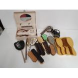 A large quantity of Clothes Brushes, Vanity and vintage Hairdryers.