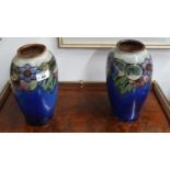 A lovely pair of Royal Doulton Vases. Tallest 24.5 cms approx.