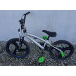A 20" Vertical Alloy BMX Bicycle with stunt pegs