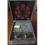 A vintage General Electric Company Portable Radio.