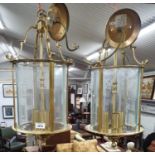 A pair of tubular formed Brass Ceiling lanterns