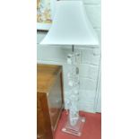 A fantastic Crystal Standard Lamp with shaped outline.(slight damage to base) RRP ?1000.H 142 cms.