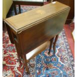 An Edwardian Mahogany Inlaid Sutherland Table with shell detail.