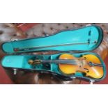 A vintage cased Violin.