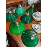 A set of six green glass Coolie Snooker Table Shades.