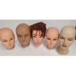 Five Mannequin styling heads.