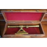 A reproduction cased Sextant in a hardwood box.