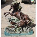 A Fabulous Bronze Figural Group of a rearing Horse signed Poitevin. 56 x 24 x 57h cms.