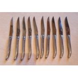A set of ten Steak Knives. Hardly used.
