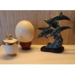 A group of Decorative Items to include San Pacific Inc. Dolphins, an Ostrich Egg and a l'objet Pot.