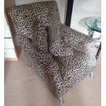 A good pair of Retro style Arm Chairs with Leopard skin style fabric.