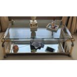 A good Brass and Glass Coffee Table with silver rope outline. 122 x 71 cms.