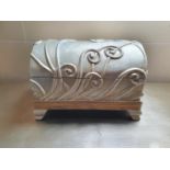 Withdrawn. A Silver Chest with free flowing decoration. 39 cms wide approx.