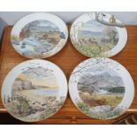 A set of 4 Royal Worcester collectors Plates.