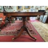 A really good Regency style three pillar Boardroom Table on tripod supports with two leaves. Fully