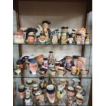 A extremely large collection of Toby Jugs some Royal Doulton.