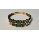 Emerald and diamond band ring, stamped 18K, ring size M, 1.5gms.