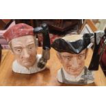 Two large Royal Doulton Toby Jugs characters from Williamsburg. 'Gunsmith' and 'Bootmaker'. H 19