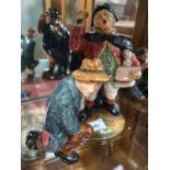 A Royal Doulton Figure of The Town Cryer (HN2119) and The Wayfarer (HN2362).