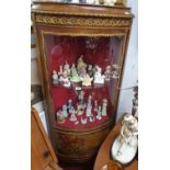 A good 19th Century Ormolu mounted Corner Cabinet with painted panel base and curved glazed top. W