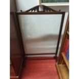 A late 19th Century Mahogany Screen with clear Glass. 61.5 x 100 cms approx.