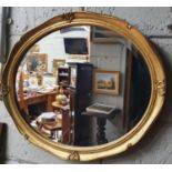 A modern Plaster Gilt Oval Mirror with bevelled glass. 56 x 46 cm approx.