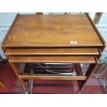 A Nest of three teak Mid Century Tables. Largest being 58 x 40 x H 50 cm approx.