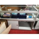 A Display Cabinet. 120 x 60 x H 89 cm approx.