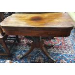 Of Superb quality a Regency Mahogany and inlaid fold over Card Table on turned quatrefoil base and