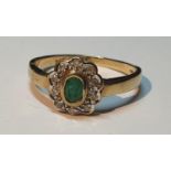 9ct gold emerald and diamond cluster ring, hallmarks for London, ring size N, 2gms.