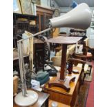 An industrial Table Lamp in good condition with an adjustable arm. H 80 cm approx.