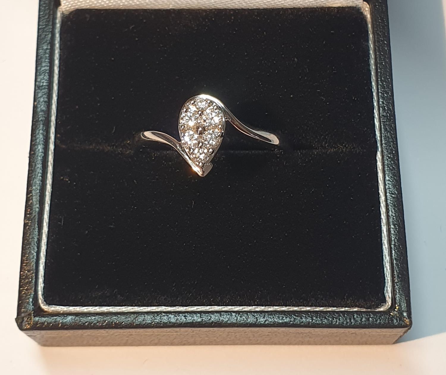 An 18ct gold brilliant-cut diamond pear-shape cluster ring. Total diamond weight 0.33ct, stamped - Image 5 of 5