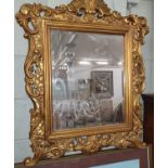 A reproduction Gilt Mirror. 64 x 84 cm approx.