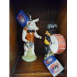 Four good Beswick musical Pigs.