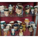 An extremely large quantity of Royal Doulton and other Toby Jugs. (11 Royal Doulton).