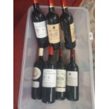 Eight bottles of French Red Wine.
