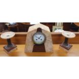An Art Deco period three-piece Marble Clock Garniture. The clock with arched outline with inlaid