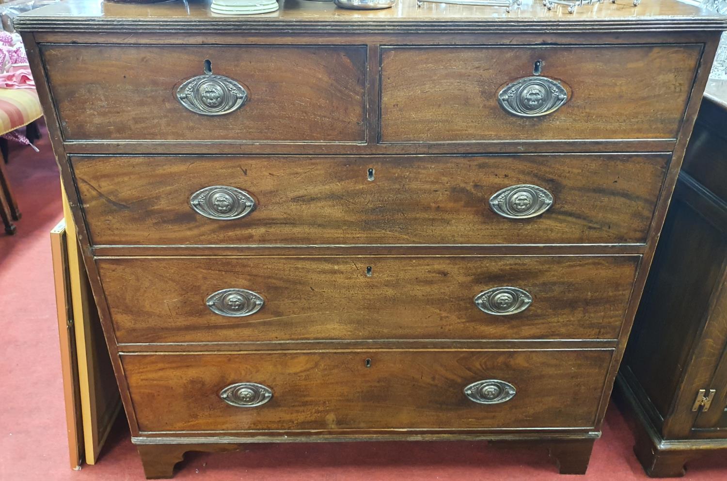 A Georgian Mahogany Chest of Drawers with two short and three long drawers. 108 x 54 x H 105 cms