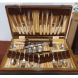 An Oak Cased two part Canteen of Cutlery.