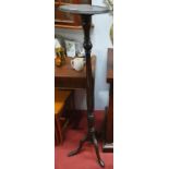 A 19th Century Mahogany Torchere. 139H x 31D cms approx.