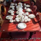 A good mid Victorian Mahogany two leaf Dining Table with turned and fluted supports. W 122 x 230 x H