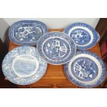 A group of blue and white Plates.