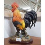 A molded Figure of a cockerel from the Leanardo Collection. 31H cms approx.