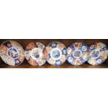 A quantity of Imari design Plates.