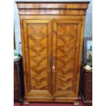 A Superb 19th Century Armoire with original key. 222cm H x 58cm D x 132 W approx.