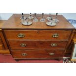 A good low Georgian Mahogany Bedroom Chest of three long graduated drawers with oval embossed
