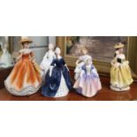 Four Royal Doulton Ladies along with two others.