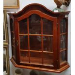 A wall mounted Display Cabinet. W 66 x D 17 x H 67 cm approx. No shelves.