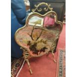 An early 20th Century Brass Mirrored Glass Fire Screen. 51 x 72 cm approx.