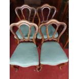 A good set of 19th Century Walnut pierced back Dining Chairs with cabriole front supports.